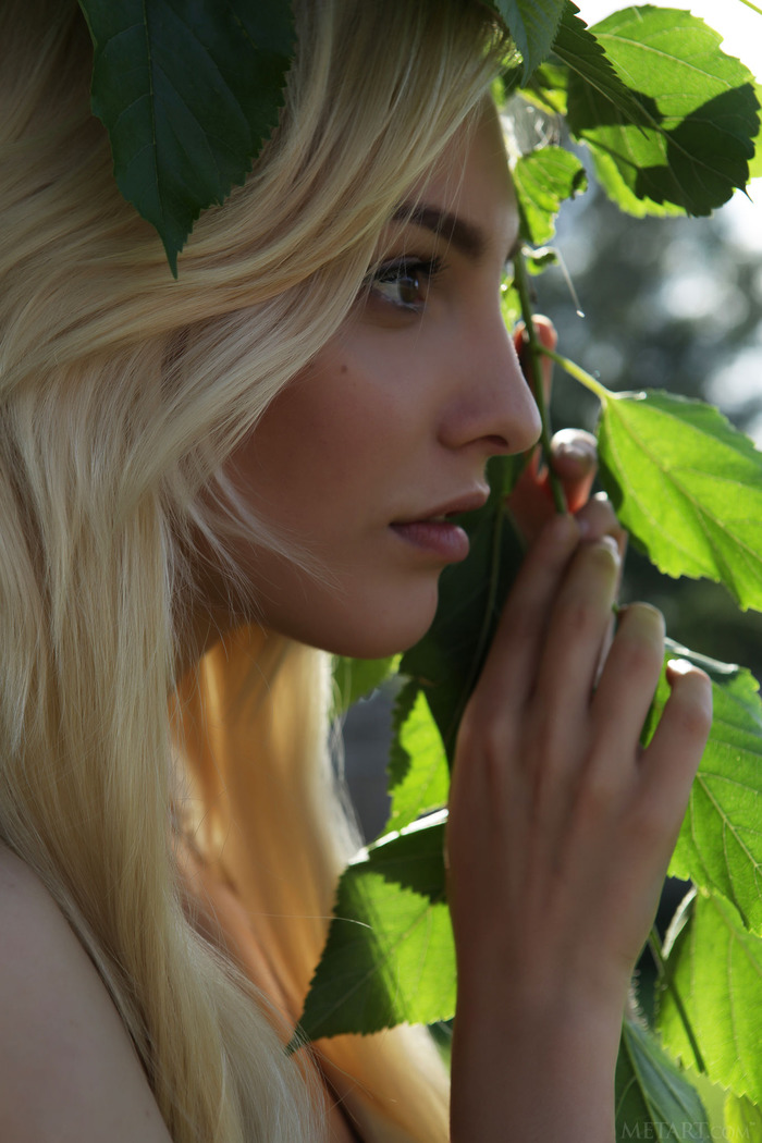  she devours a succulent raspberry between her luscious lips