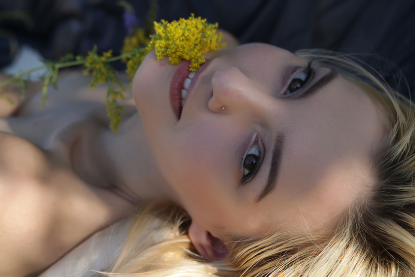  she devours a succulent raspberry between her luscious lips