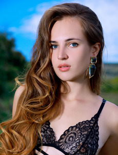 The Green-eyed Russian Beauty Is So Seductive As She Turns To Show How The Garterbelt Frames Her Hot Ass.