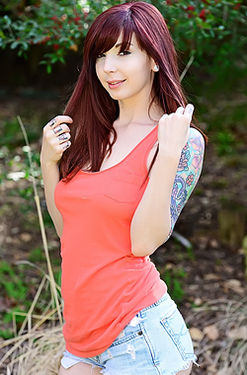 Ivy Snow posing outdoors 