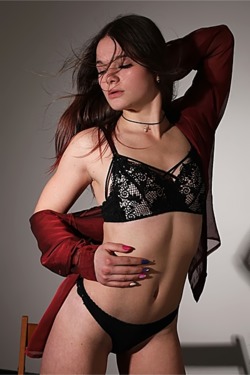 Hot Ukrainian brunette Harley has such an air of sensuality as she strips down to her sexy lingerie